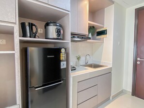 Standard Studio, 1 Bedroom | Private kitchen - Enjoy Living Studio At Apartment Pollux Chadstone (Cikarang)