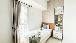 Unclassified image, 5 of 27, button - Brown Accent 2Br At Apartment Casa De Parco (Pagedangan)