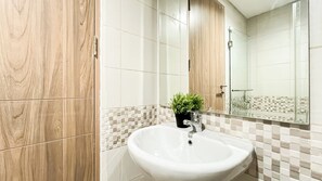 Standard Studio, 1 Bedroom | Bathroom - Homey Studio At Tamansari Iswara Apartment (Bekasi)