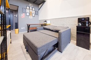 Standard Studio, 1 Bedroom | Living area - Comfy Dan Warm Studio Soho At Collins Boulevard Apartment (Tangerang)