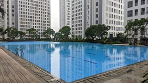 Outdoor pool - Chic And Sleek 2Br At Apartment M-Town Residence (Gading Serpong)