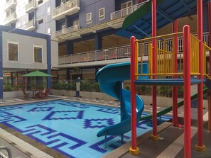 Outdoor pool - Modern And Homey 2Br Apartment Grand Center Point Bekasi (Bekasi)