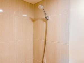 Standard Studio, 1 Bedroom | Bathroom - Comfy Warm Tone Studio At Meikarta Apartment (Cikarang)