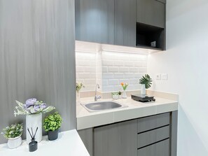 Standard Apartment, 1 Bedroom | Private kitchen - Comfy And Trendy 1Br At Vasanta Innopark Apartment (Cikarang)