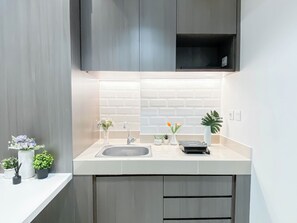 Standard Apartment, 1 Bedroom | Private kitchen - Comfy And Trendy 1Br At Vasanta Innopark Apartment (Cikarang)