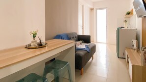 Living area - Comfy Warm Tone 1Br At Apartment Bassura City (Jakarta)