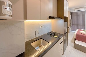 Standard Studio, 1 Bedroom | Private kitchen - Wonderful Design Studio At Bale Hinggil Apartment (Surabaya)