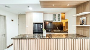 Standard Studio, 1 Bedroom | Private kitchen - Relaxing Studio At Apartment Tokyo Riverside Pik 2 (Teluknaga)