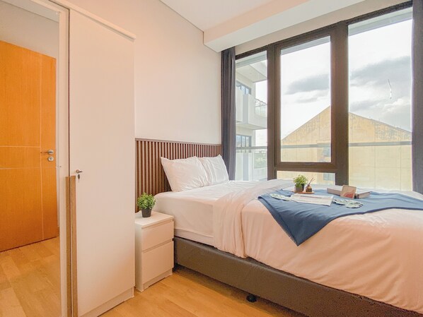 Apartamento standard, 2 quartos | Roupa de cama