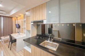 Standard Apartment, 2 Bedrooms | Private kitchen - Comfy And Spacious 2Br At Grand Sungkono Lagoon Apartment (Surabaya)