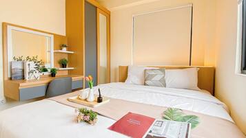 Apartamento standard, 2 quartos | Roupa de cama