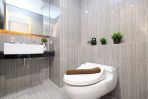 Standard Studio, 1 Bedroom | Bathroom - Simple Designed And Homey Studio At Apartment Capitol Suites (Jakarta)