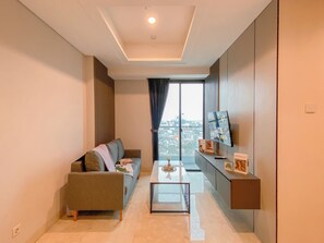 Standard-Apartment, 2 Schlafzimmer | Wohnbereich