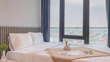 Apartamento estándar, 2 habitaciones | Ropa de cama