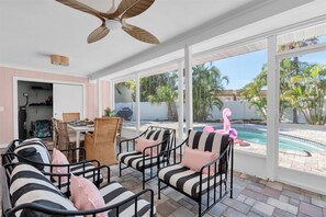 Outdoor dining - Flamingo Fling - Pool, Hot Tub & Putting Fun! (Holmes Be)