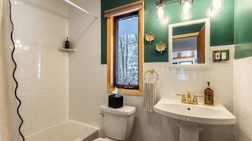 Hair dryer, towels, soap, toilet paper