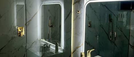 Shower, hair dryer, towels, soap
