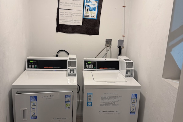 Coins/app operated washer and dryer in the common area