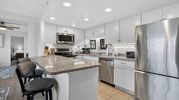 Coffee/tea maker, fridge, microwave, oven