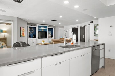 Pink Pineapple ~ Walk to Downtown ~ Chic Heated Pool Home