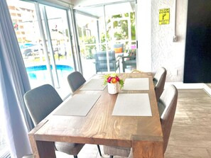 Dining - Pink Pineapple ~ Walk to Downtown ~ Chic Heated Pool Home (Cape Coral)