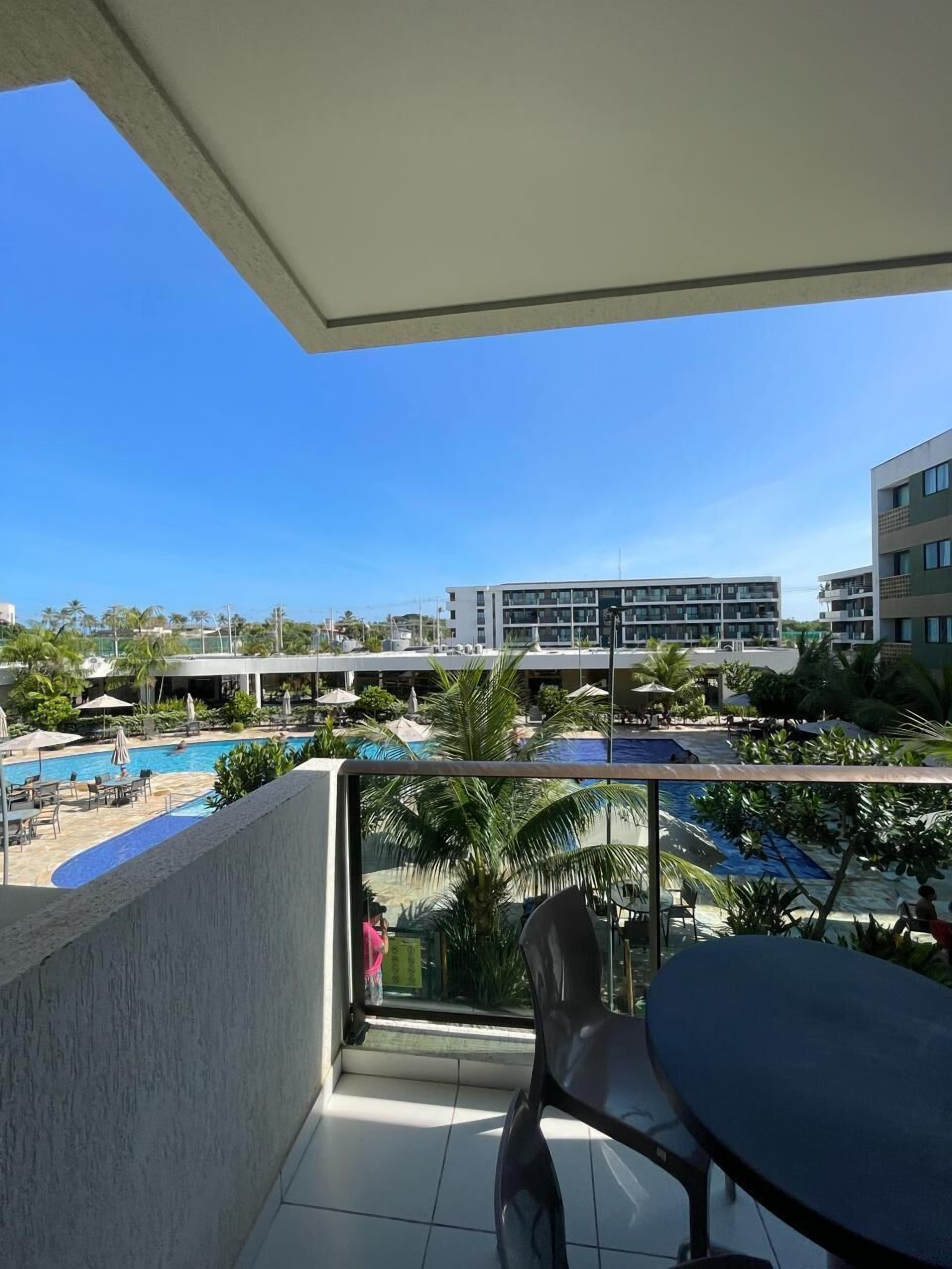 Apartamento conforto, vista para a piscina | Terraço/pátio