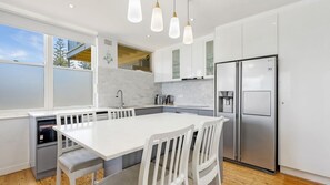 Stovetop, dishwasher, coffee/tea maker, electric kettle - Oceanfront Stay Steps to the Sand (The Entrance)