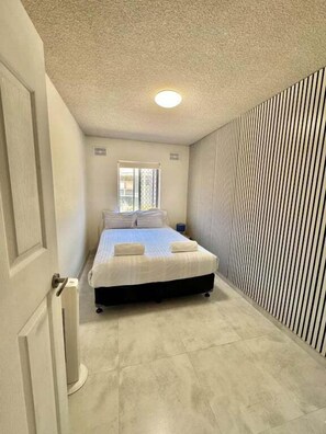 مكواة/لوح كي وملاءات أسرّة