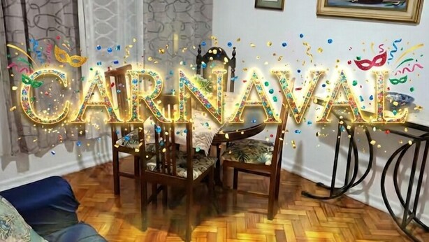 A room with a herringbone wooden floor, a blue sofa, and a dining table with chairs. - 3 Minutos da Praia - Prime Location (Rio de Janeiro)