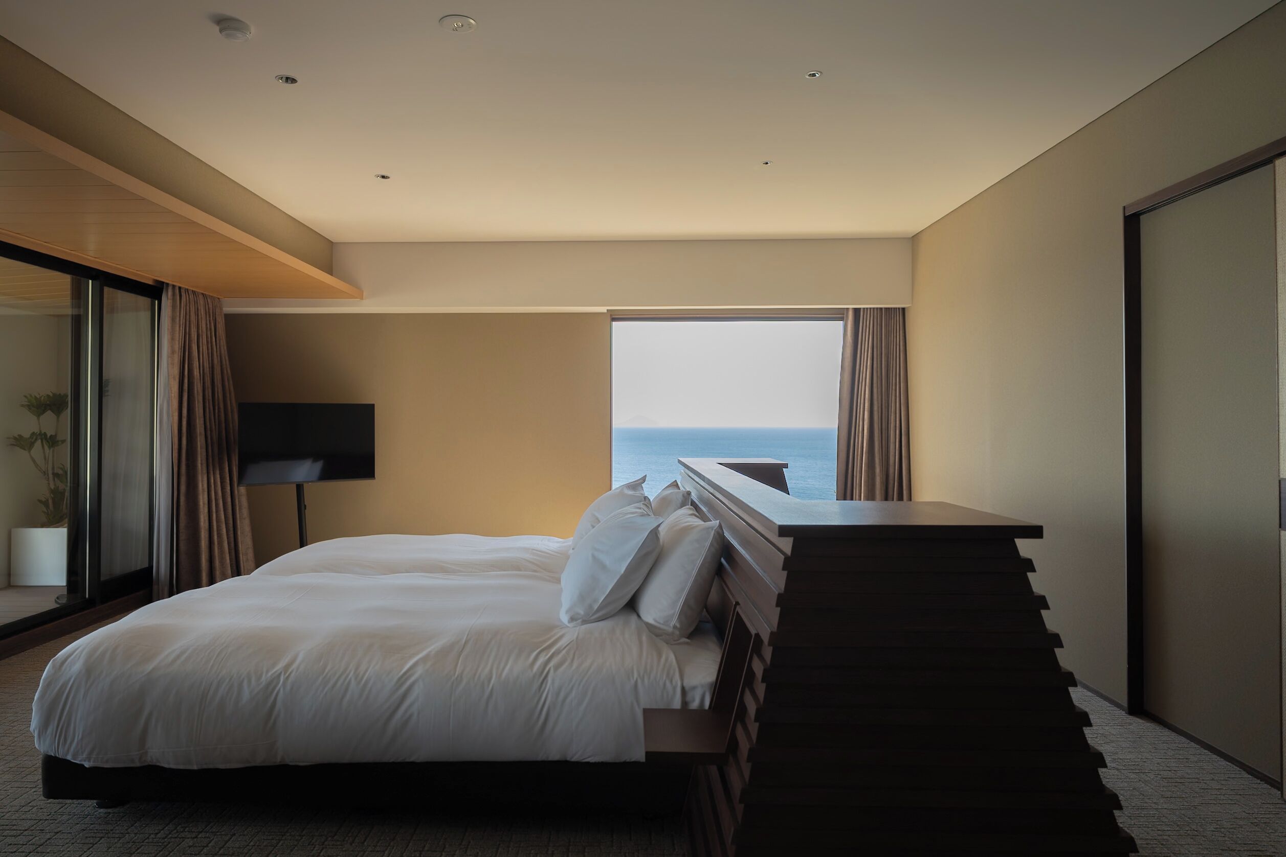Luxury Suite, Sauna, Ocean View | Hypo-allergenic bedding, down comforters, free minibar items, desk