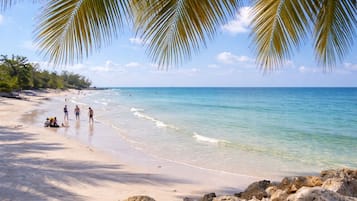 Beach nearby, white sand, beach umbrellas, 4 beach bars