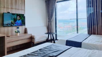 Family Triple Room, Partial Sea View | Blackout drapes, soundproofing, free WiFi