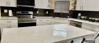 Beautiful 5 bedroom/ 3 bathroom pool home, on 1.29 acres in West Palm Beach.