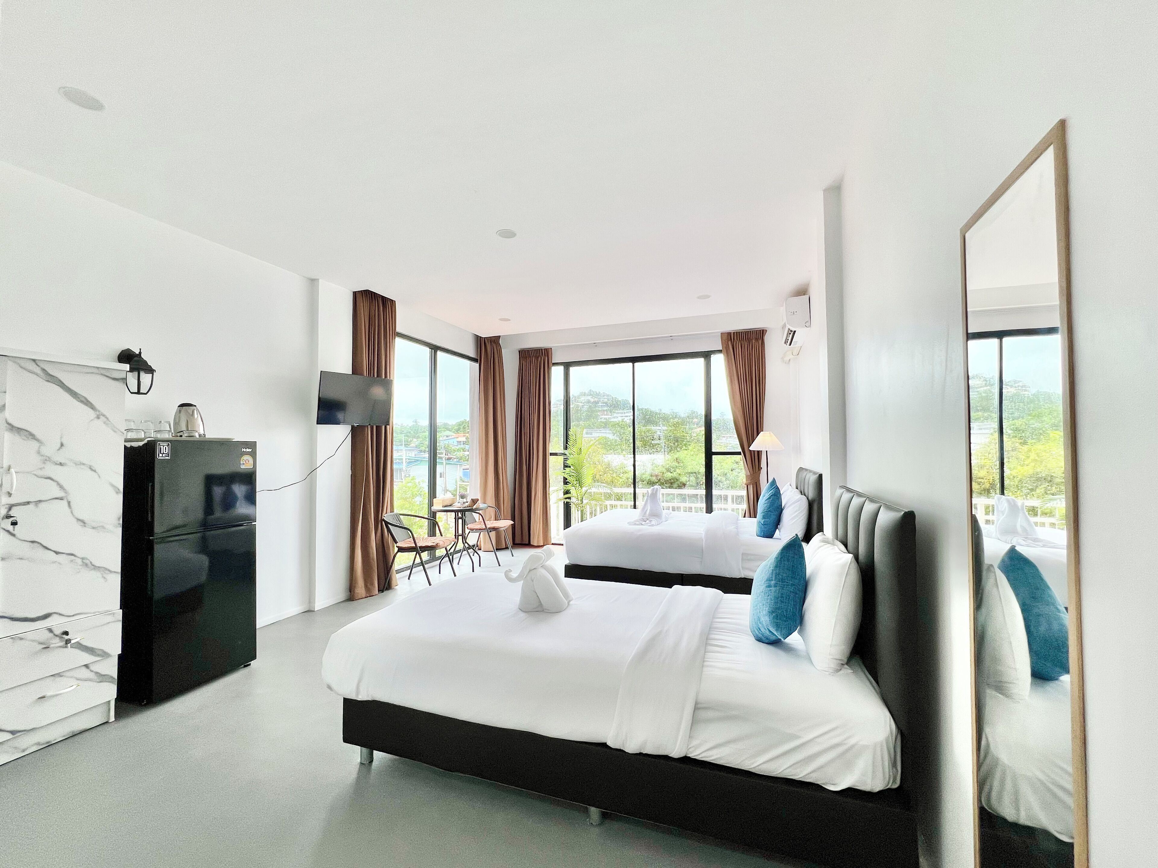 Triple Room, Balcony, Pool View | Laptop workspace, iron/ironing board, free WiFi