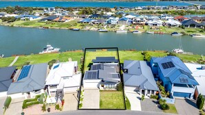A residential area with houses and a marina.