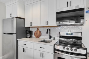 Fridge, microwave, oven, stovetop - Brookside II B-208 Sunday River Ski in Ski Out Condo (Newry)