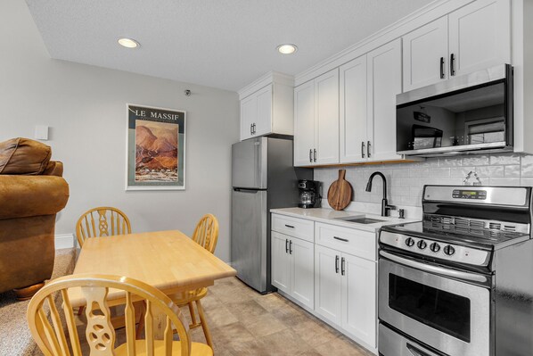 Fridge, microwave, oven, stovetop - Brookside II B-208 Sunday River Ski in Ski Out Condo (Newry)