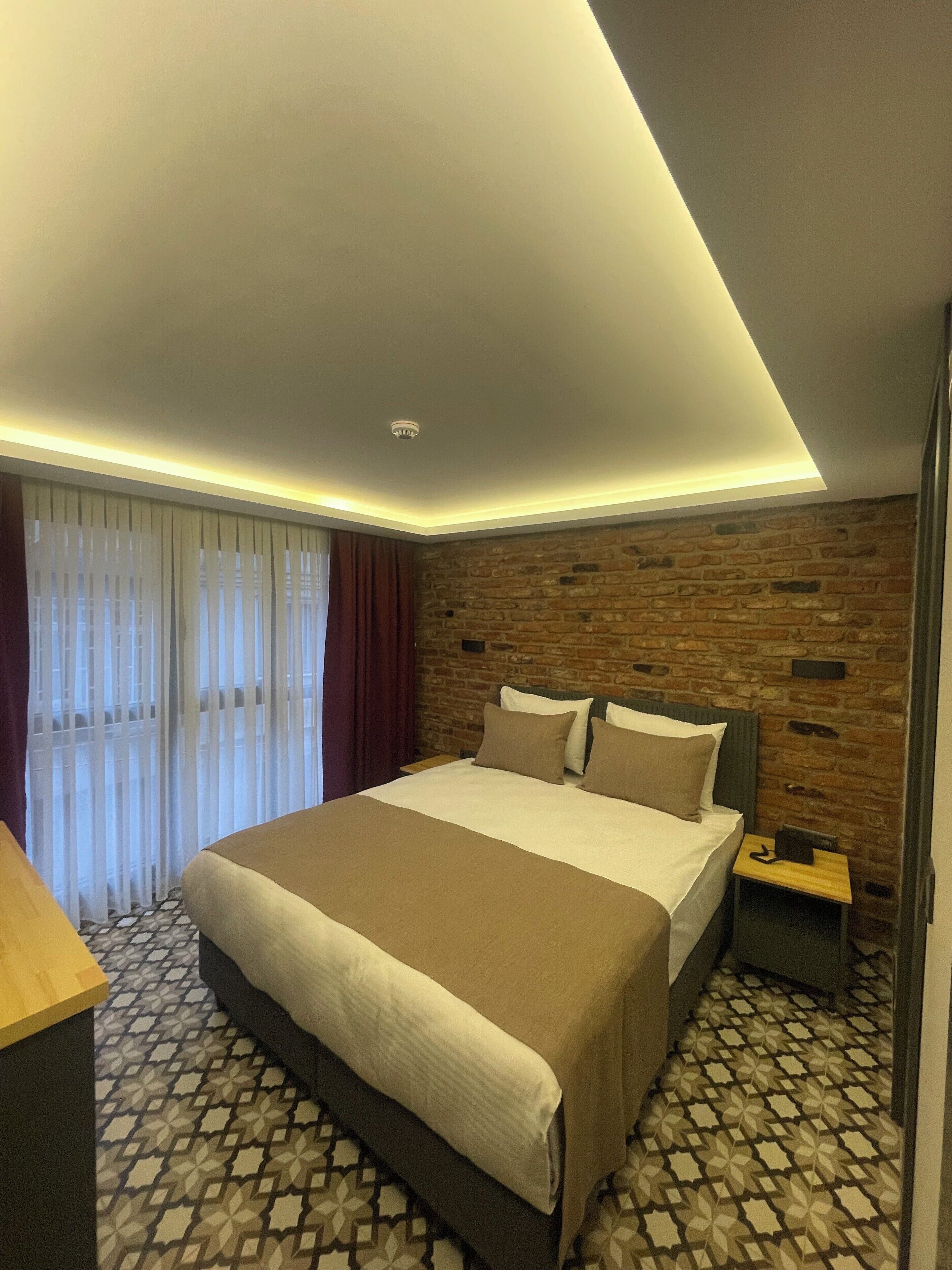 Deluxe Double Room, 1 Queen Bed, Non Smoking, Balcony | In-room safe, blackout drapes, soundproofing, iron/ironing board