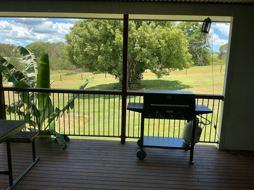 Just off the highway , 2 kilometres to town but still in the country.