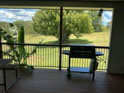 Just off the highway , 2 kilometres to town but still in the country.