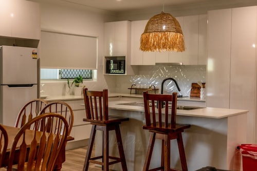 Just off the highway , 2 kilometres to town but still in the country.