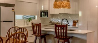 Just off the highway , 2 kilometres to town but still in the country.