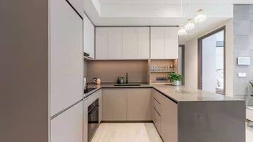 Presidential Suite, 2 Bedrooms, Club Lounge Access, City View | Private kitchen | Full-size fridge, microwave, oven, stovetop