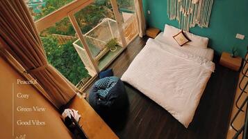 Deluxe Room, Balcony, City View | Memory-foam beds, minibar, individually decorated, desk