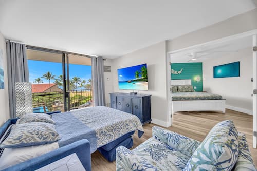 Luxury-Apartment, Klimaanlage, eingeschränkter Meerblick | Verdunkelungsvorhänge, kostenloses WLAN