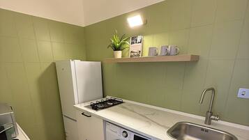 Comfort Apartment, City View | Private kitchen | Fridge, stovetop, cookware/dishes/utensils