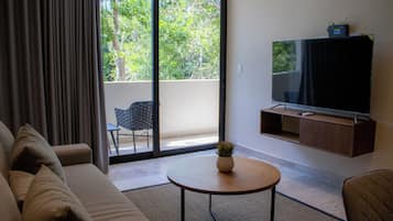 Apartamento luxo, sacada, vista para o jardim | Sala de estar