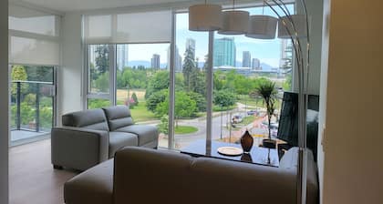 Luxury Living New Condo Overlooking Holland Park and central surrey down town.