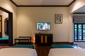 Habitación Premier, vista al jardín | Caja de seguridad en la habitación, cortinas blackout y insonorización