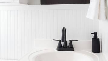 Hair dryer, towels, soap, toilet paper